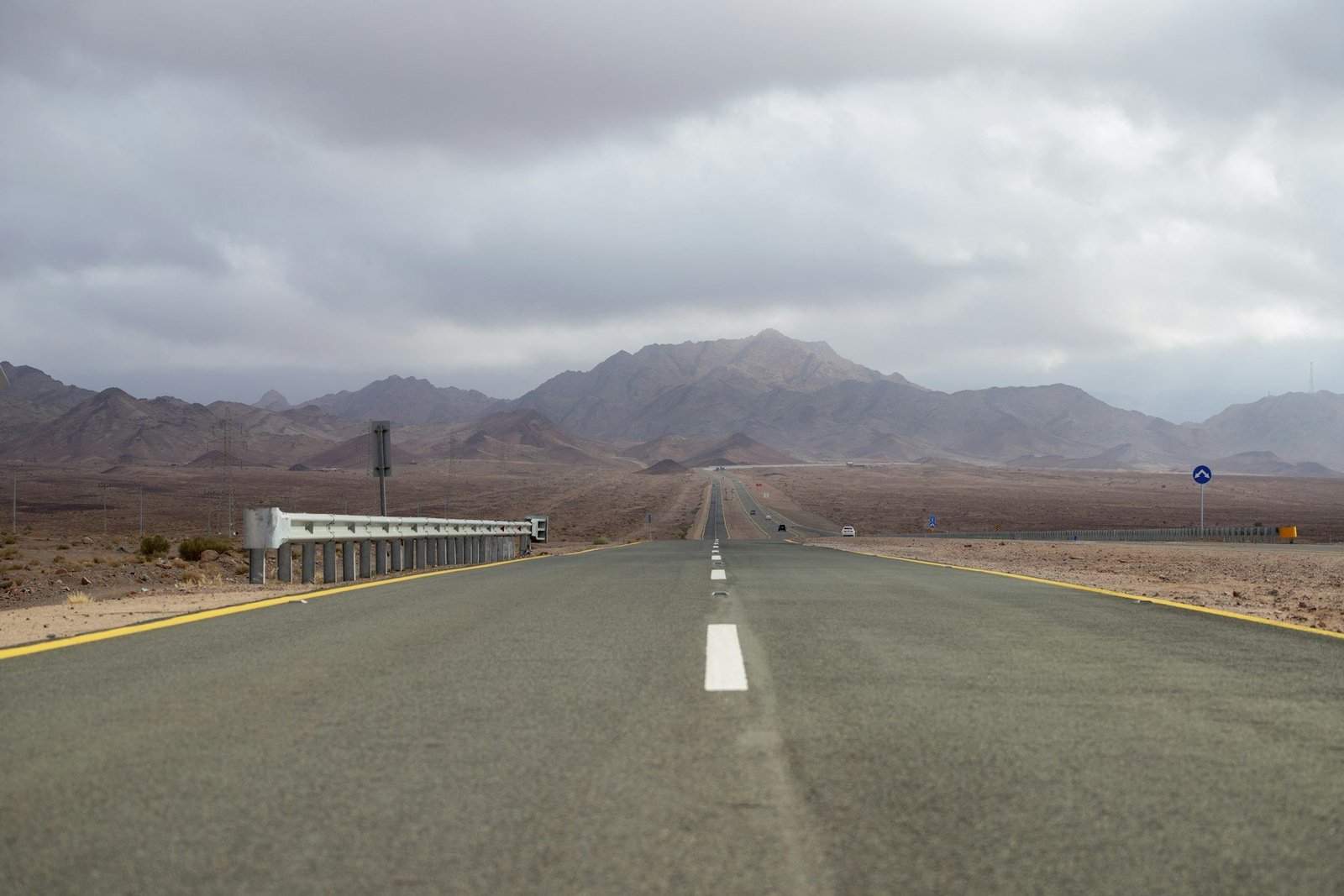 An open road through Saudi Arabia’s rugged mountain landscape